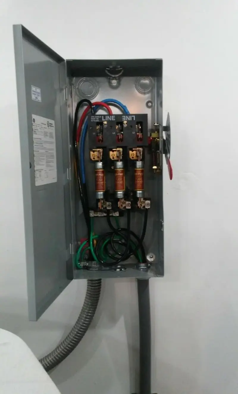 Three-phase disconnect switch installed for Smoke Detector Installation in West Pensacola